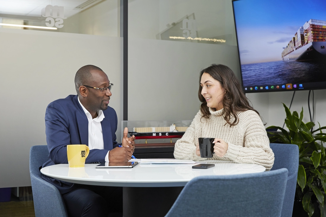 People having a conversation at a table